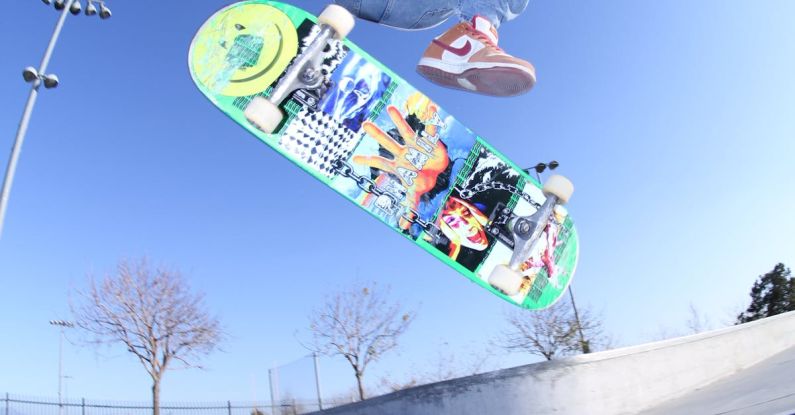 Risk Reward - Cool black teenager doing skateboard trick