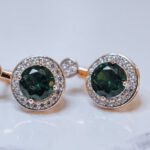 Holistic Wealth - A pair of green and white diamond earrings