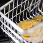 Crypto Selection - Gold Bitcoin Coins in a Miniature Shopping Cart
