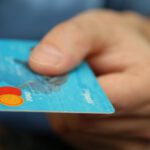 Debt Reduction - Person Holding Debit Card