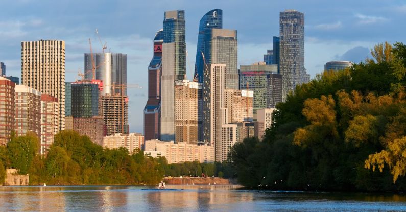 Roadmap Finance - A city skyline with tall buildings and trees in the background