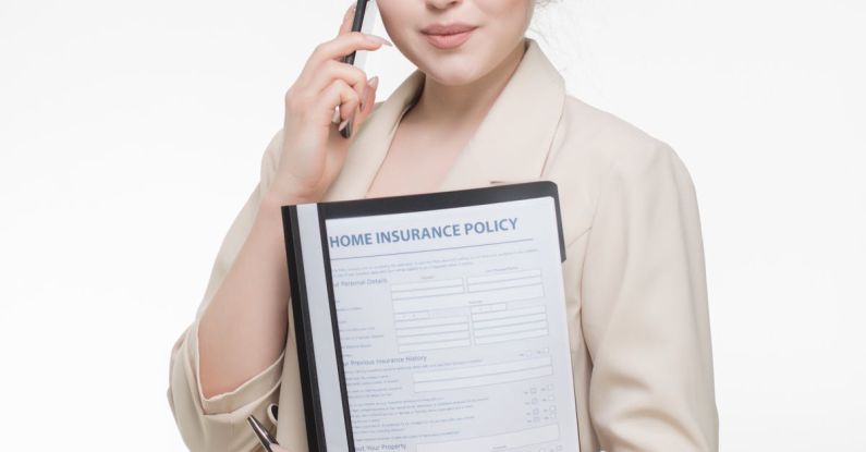 Insurance Policy - A Woman in Beige Blazer Holding a Document while Having a Phone Call