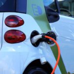 Electric Vehicle - White and Orange Gasoline Nozzle
