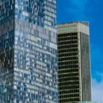 Financial Recovery - A tall building with many windows and a blue sky