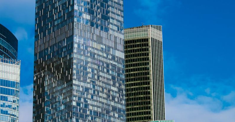 Financial Recovery - A tall building with many windows and a blue sky