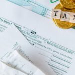 Balance Savings - Tax Documents on the Table