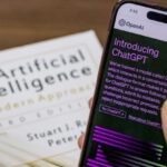 AI Startup - Webpage of ChatGPT, a prototype AI chatbot, is seen on the website of OpenAI, on iPhone or smartphone