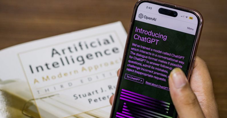 AI Startup - Webpage of ChatGPT, a prototype AI chatbot, is seen on the website of OpenAI, on iPhone or smartphone