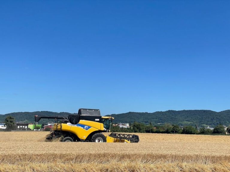 AgriTech - a yellow tractor in a field