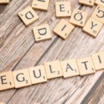Regulatory Changes - Scrabble letters spelling the word regulation