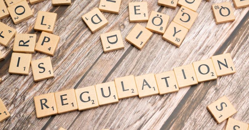 Regulatory Changes - Scrabble letters spelling the word regulation